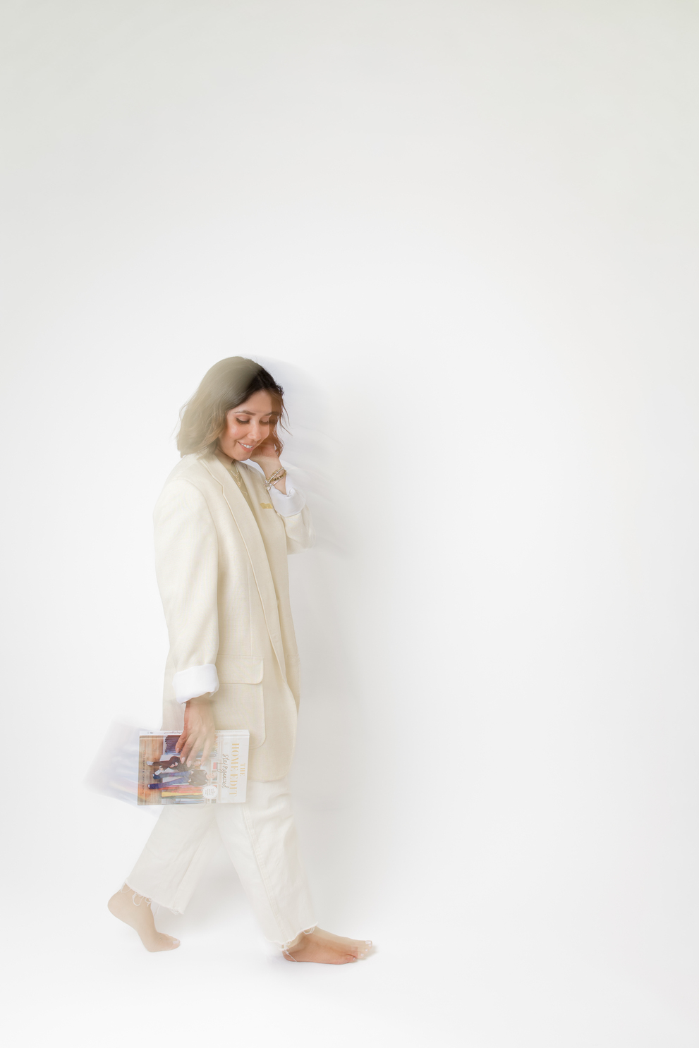 Person walking through a spotless white space